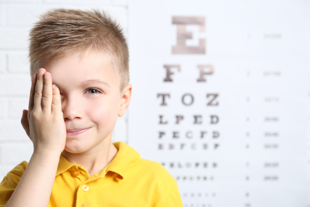 Little boy having eye test at Eye Doctor office