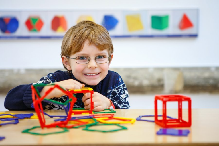 Little kid wearing glasses