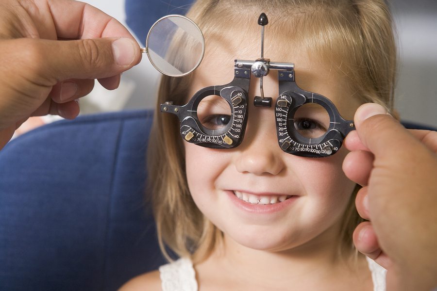 Little girl having her vision tested