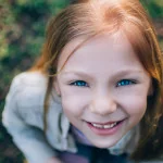 Little girl looking up