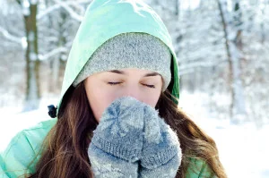 Wintertime picture woman outside in snow